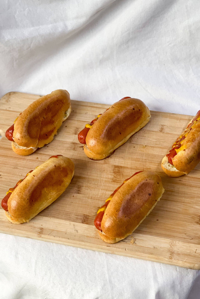 
                  
                    Load image into Gallery viewer, Brioche Hotdog Buns Bread The Daily Knead 
                  
                