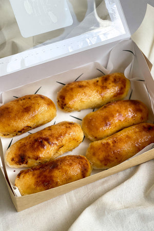 
                  
                    Load image into Gallery viewer, Creme Brulee Roll Sweet The Daily Knead 
                  
                