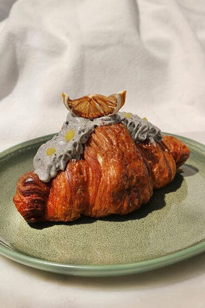 
                  
                    Load image into Gallery viewer, Flavored Croissants - MKT PopUp The Daily Knead Black Sesame Lemon 
                  
                