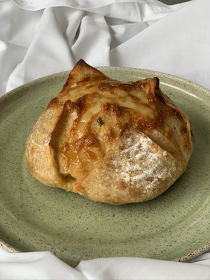 
                  
                    Load image into Gallery viewer, Sourdough Cheddar Jalapeño Bread The Daily Knead Bakery 
                  
                