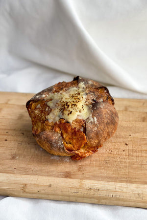 
                  
                    Load image into Gallery viewer, Sourdough Three Cheese &amp;amp; Roasted Garlic Bread The Daily Knead Classic 
                  
                