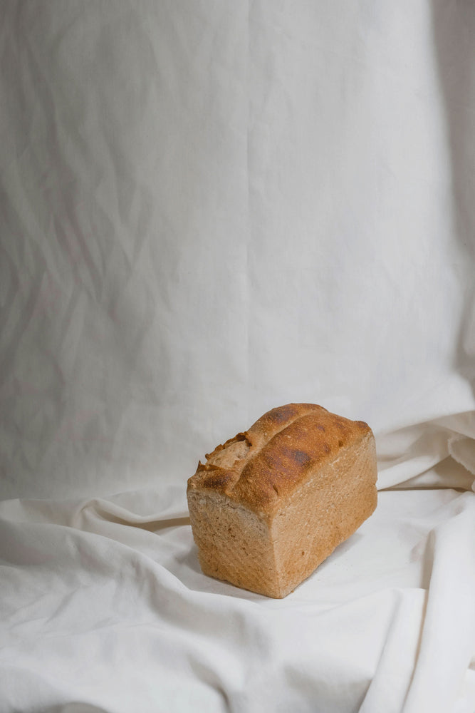 
                  
                    Load image into Gallery viewer, Sourdough Whole Wheat Loaf Bread The Daily Knead Bakery 
                  
                