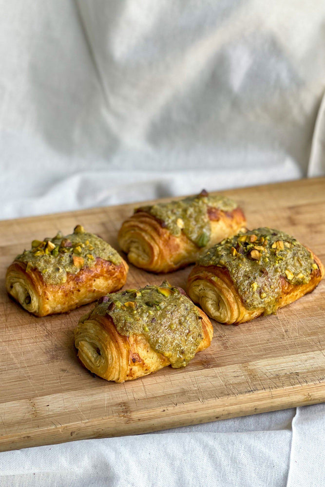 
                  
                    Load image into Gallery viewer, Twice-Baked Pistachio Pain au Choc Sweet The Daily Knead 
                  
                